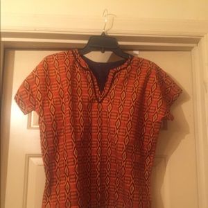 Boy’s kente cloth dashiki with matching hat.